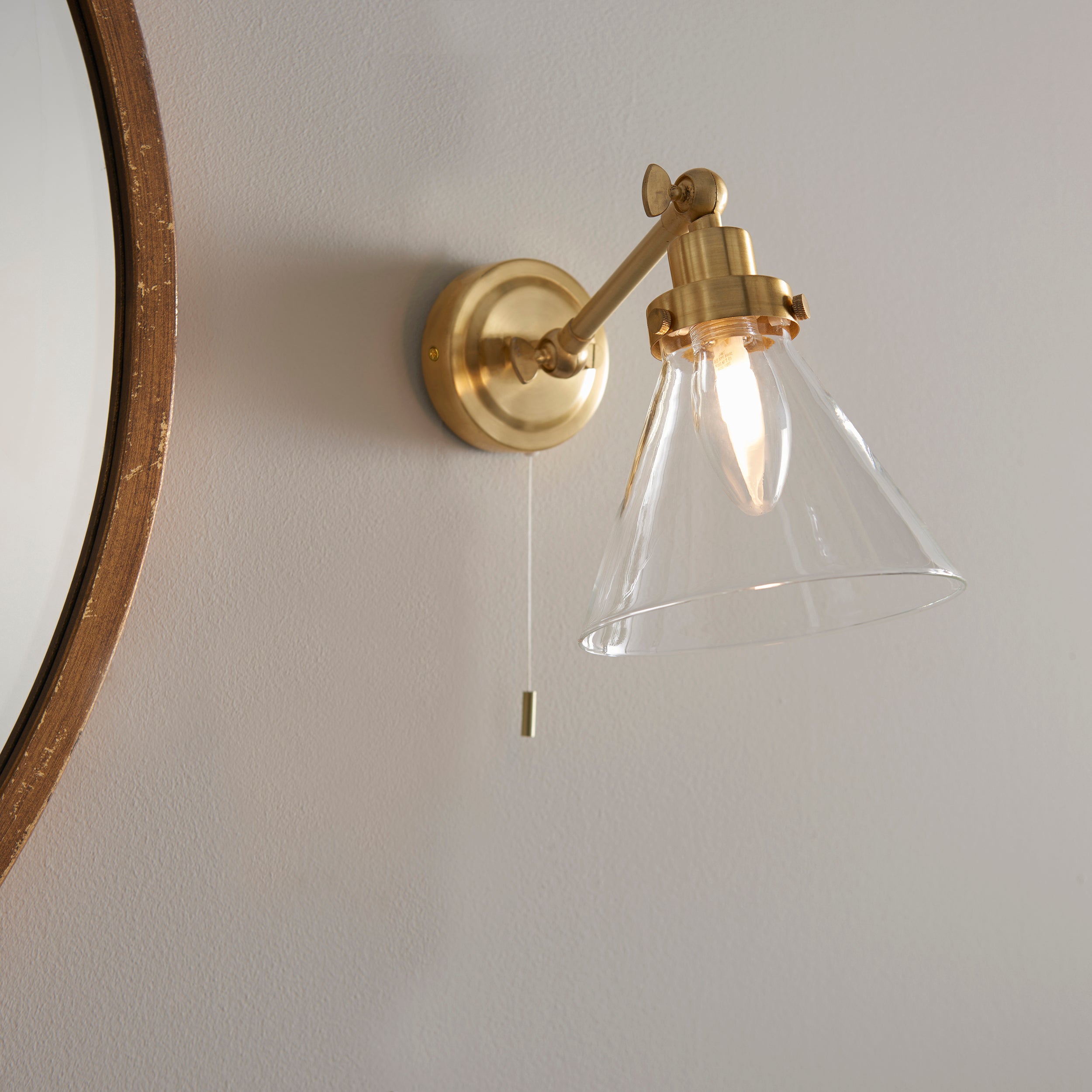 Faraday Contemporary Wall Light. Satin Brass & Clear Glass Shade